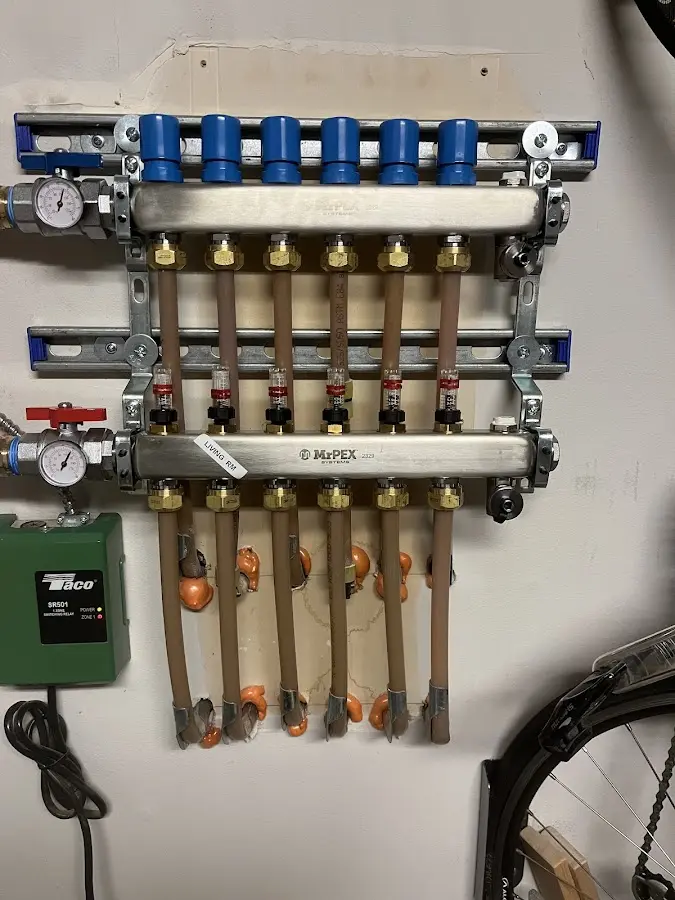 Plumber performing Gas Line Installation at a residential property in Handy